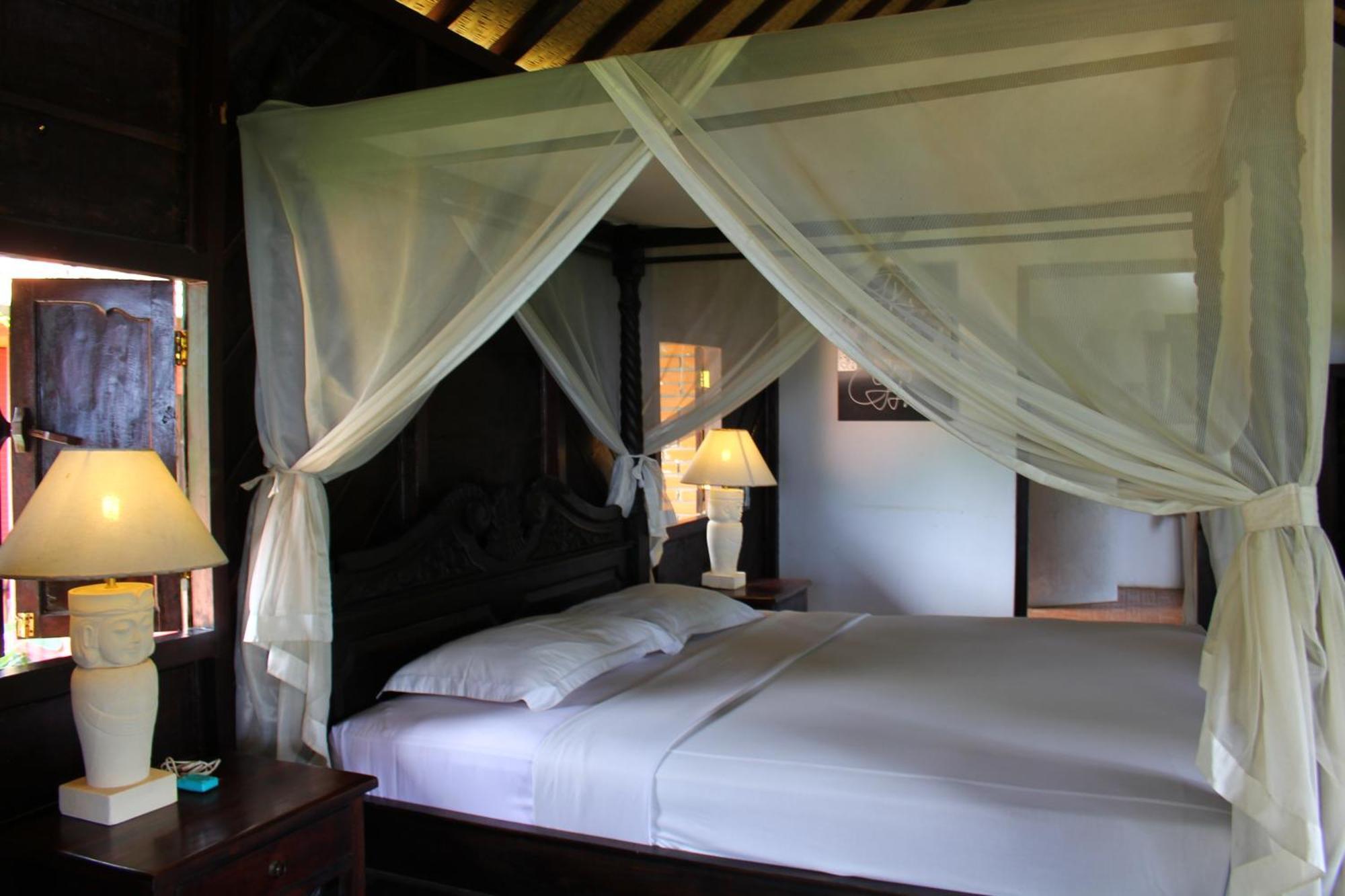 Melanting Cottages موندوغْ الغرفة الصورة